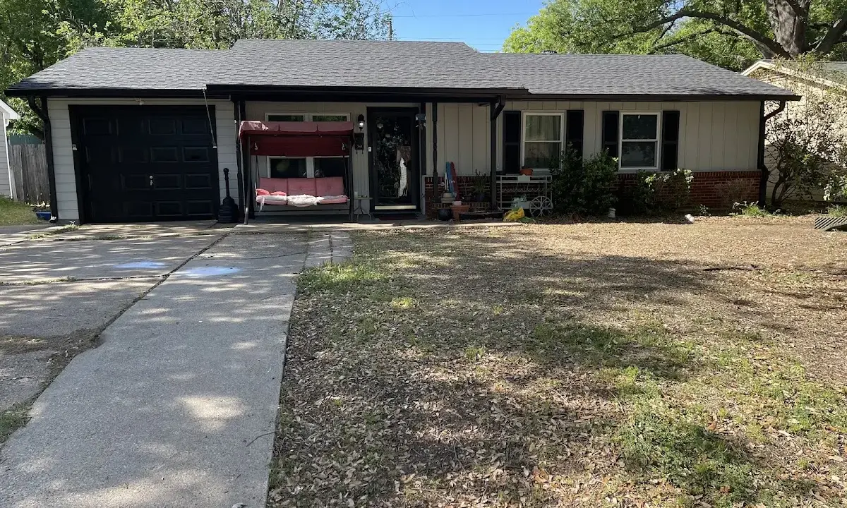 Asphalt Shingle Roof Repair crew at work on a residential roof in Sweet Home